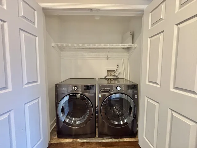 a utility room with dryer and washer