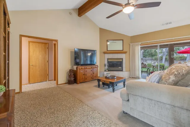 a large kitchen with stainless steel appliances granite countertop a sink and cabinets