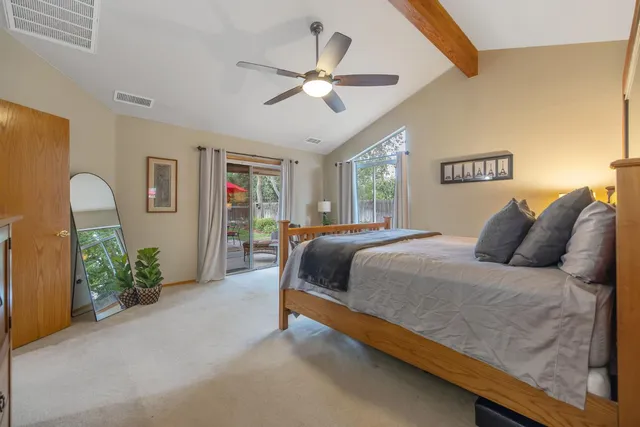 a view of a outdoor space with a patio and a garden