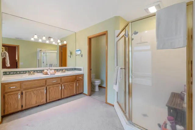 a view of a backyard with swimming pool