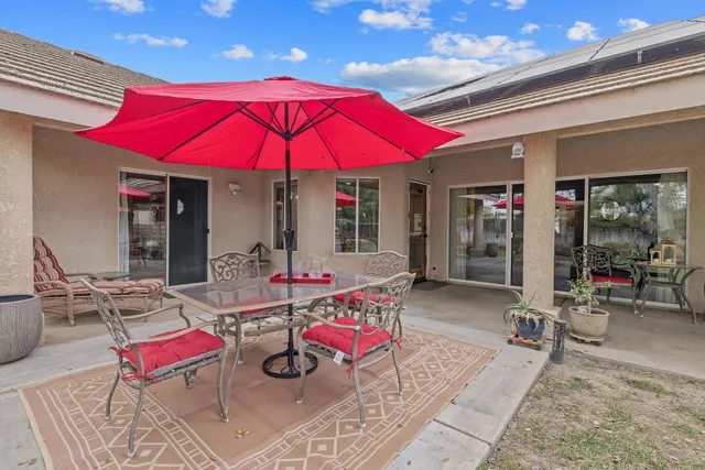 a view of an outdoor space with furniture