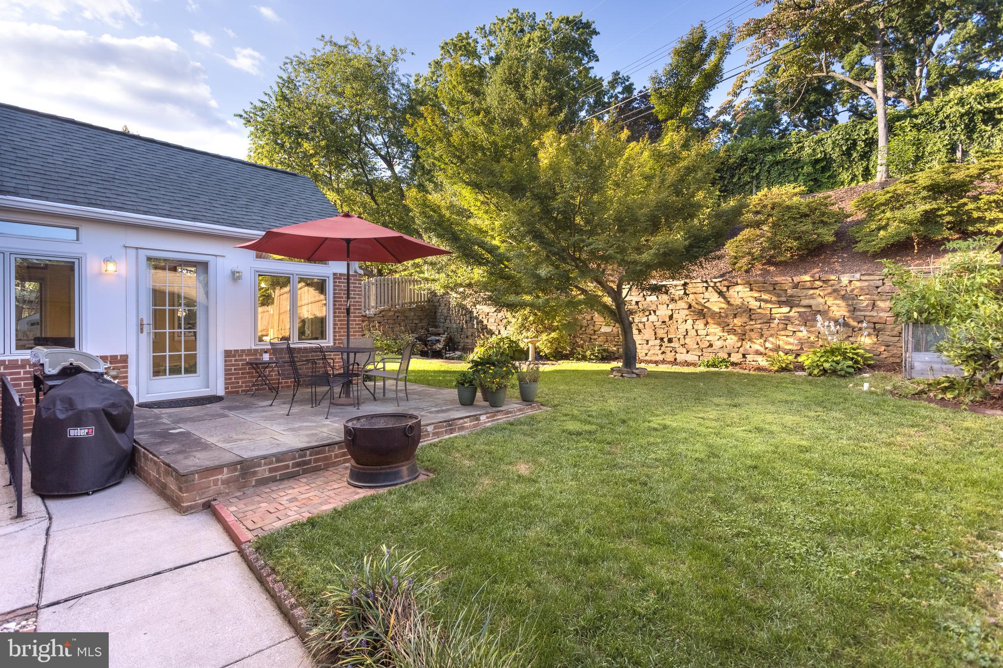 416 Aigburth Road Towson, MD 21286 - Photo 26 of 37 Amazing backyard with patio & stone retaining wall
