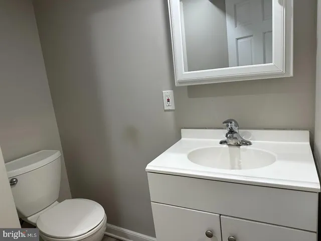 a bathroom with a sink and a toilet