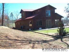 810 Greenwood Road Landrum, SC 29356 - Photo 1 of 7 a house view with a backyard space