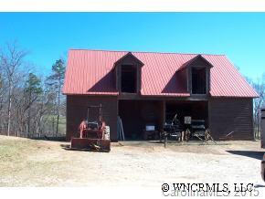 810 Greenwood Road Landrum, SC 29356 - Photo 4 of 7 a view of a two chairs in the patio