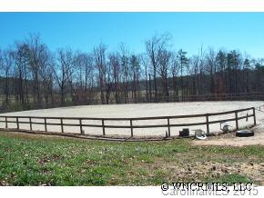 810 Greenwood Road Landrum, SC 29356 - Photo 6 of 7 a view of a yard with a bench