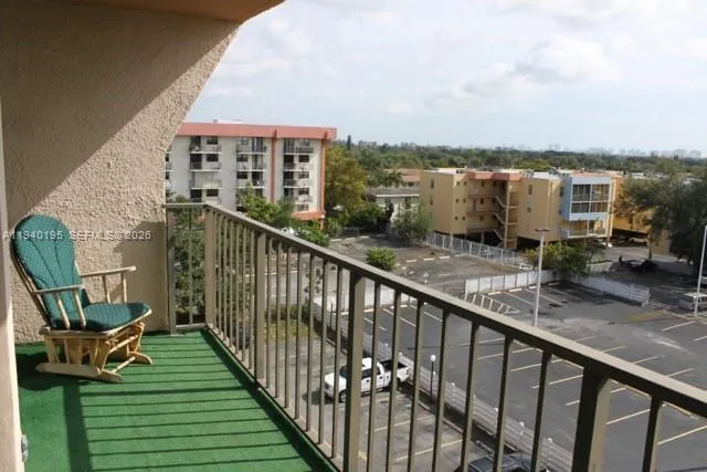 a balcony with sitting area