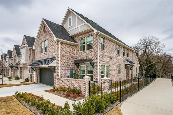 a front view of a house with a porch