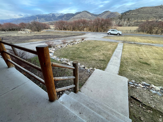 333 Lago Liberty Road Grace, ID 83241 - Photo 16 of 35 View of yard featuring a mountain view