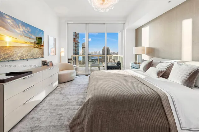 a living room with furniture and a lamp