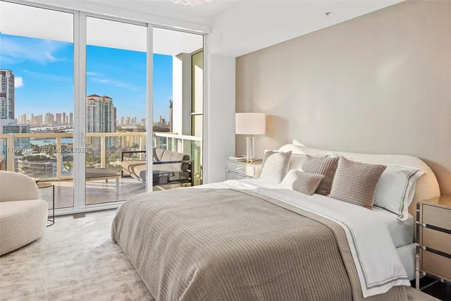 a kitchen with granite countertop a sink and a stove top oven