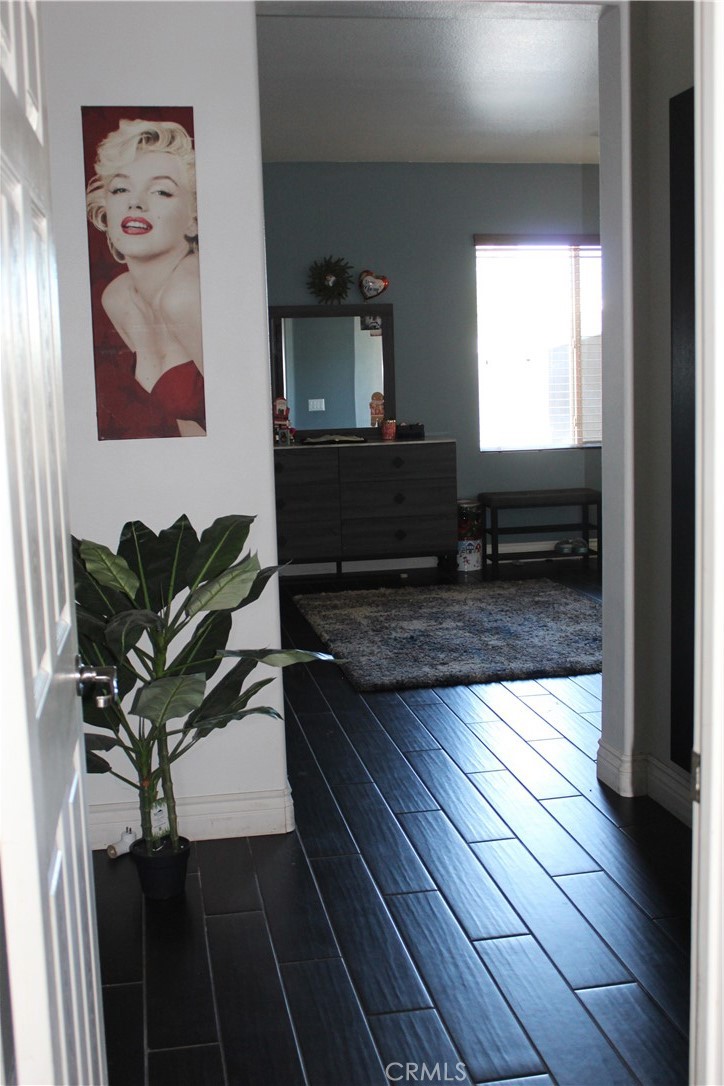 1382 Sunset Avenue Perris, CA 92571 - Photo 13 of 23 a living room with furniture and a window