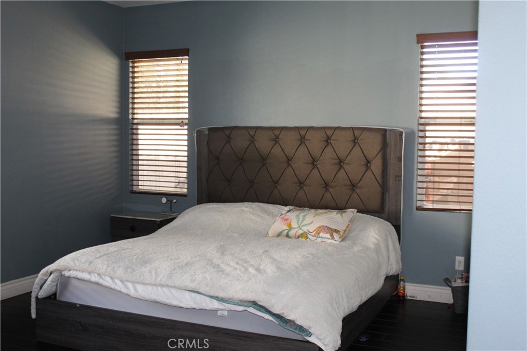 1382 Sunset Avenue Perris, CA 92571 - Photo 17 of 23 a bedroom with a bed and a window