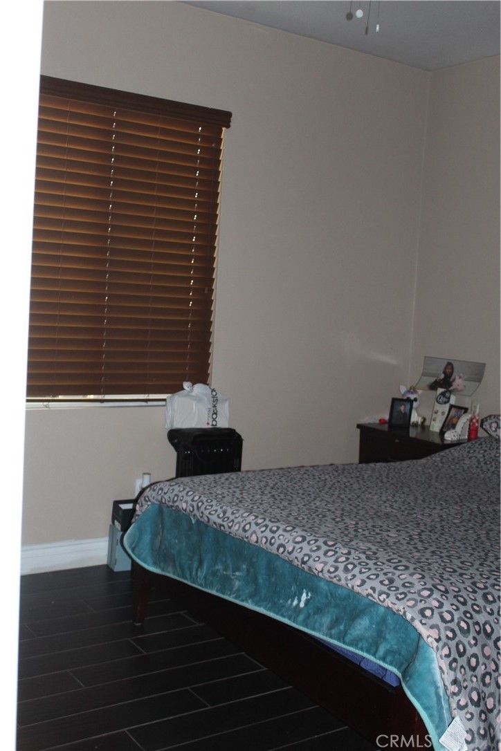 1382 Sunset Avenue Perris, CA 92571 - Photo 20 of 23 a bedroom with a bed and a window