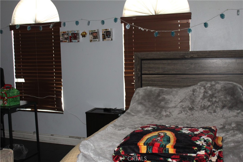 1382 Sunset Avenue Perris, CA 92571 - Photo 22 of 23 a side view of a fireplace