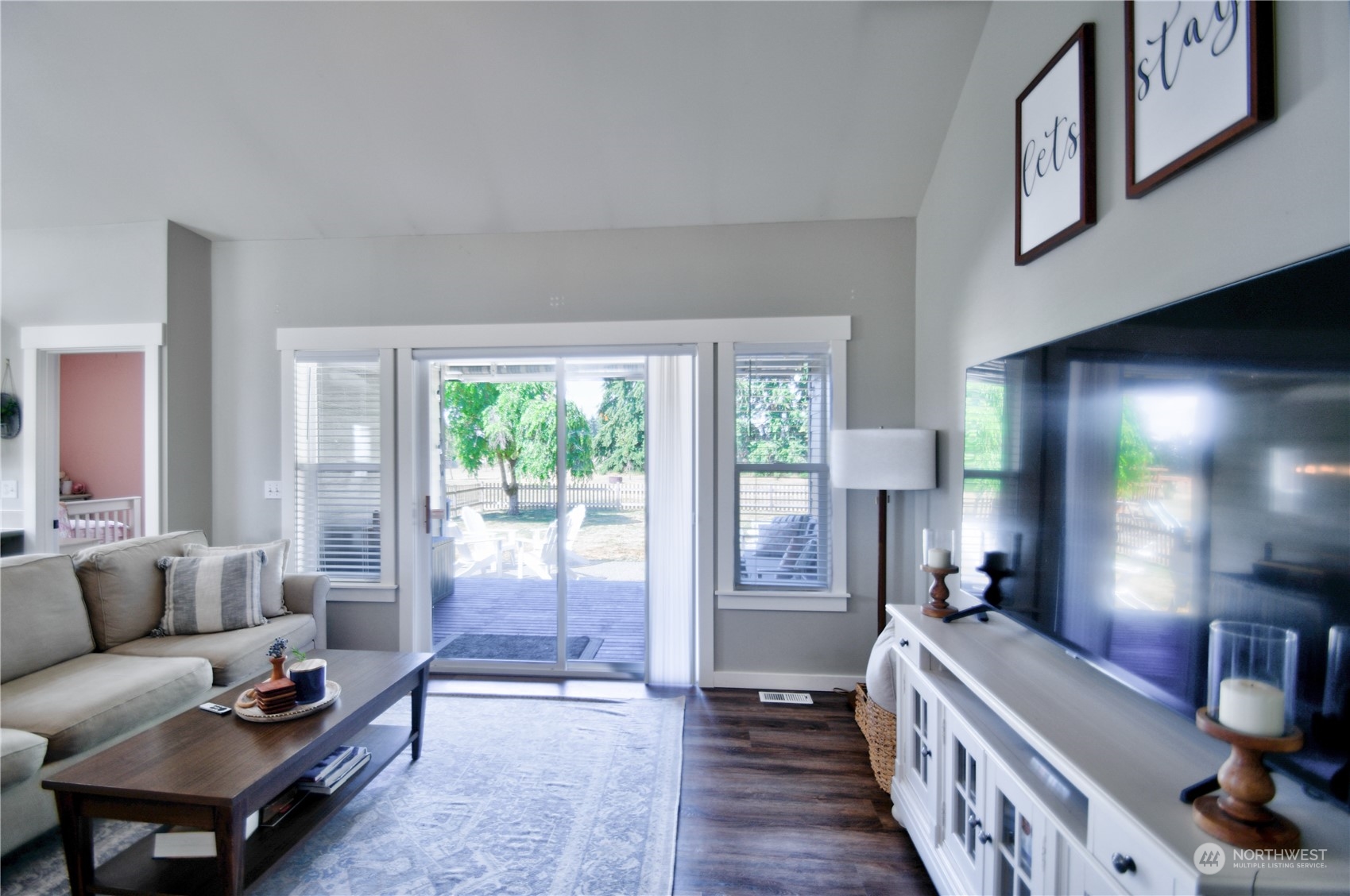 16637 Sheldon Lane Southwest Rochester, WA 98579 - Photo 11 of 40 a living room with furniture and a large window