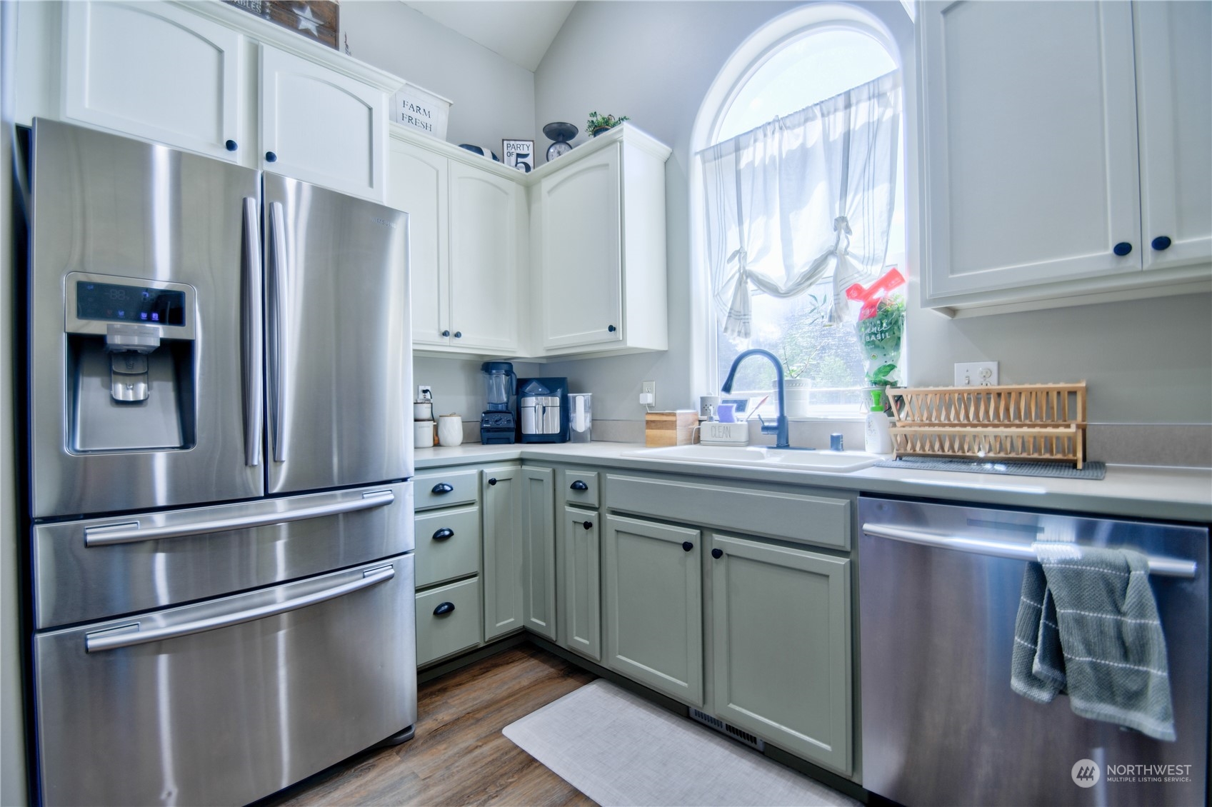 16637 Sheldon Lane Southwest Rochester, WA 98579 - Photo 14 of 40 a kitchen with appliances cabinets and a sink