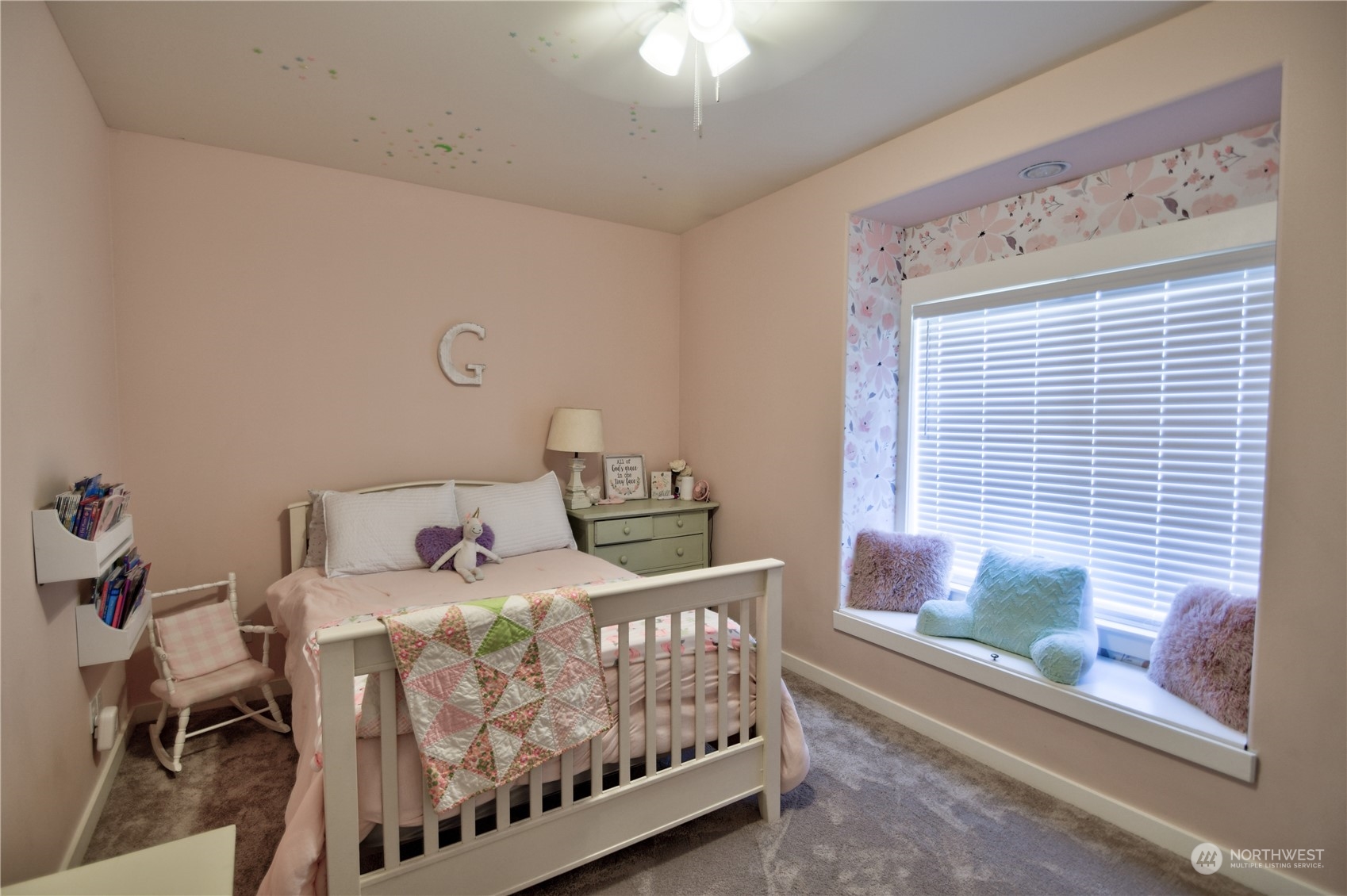 16637 Sheldon Lane Southwest Rochester, WA 98579 - Photo 21 of 40 a bedroom with a bed and a window