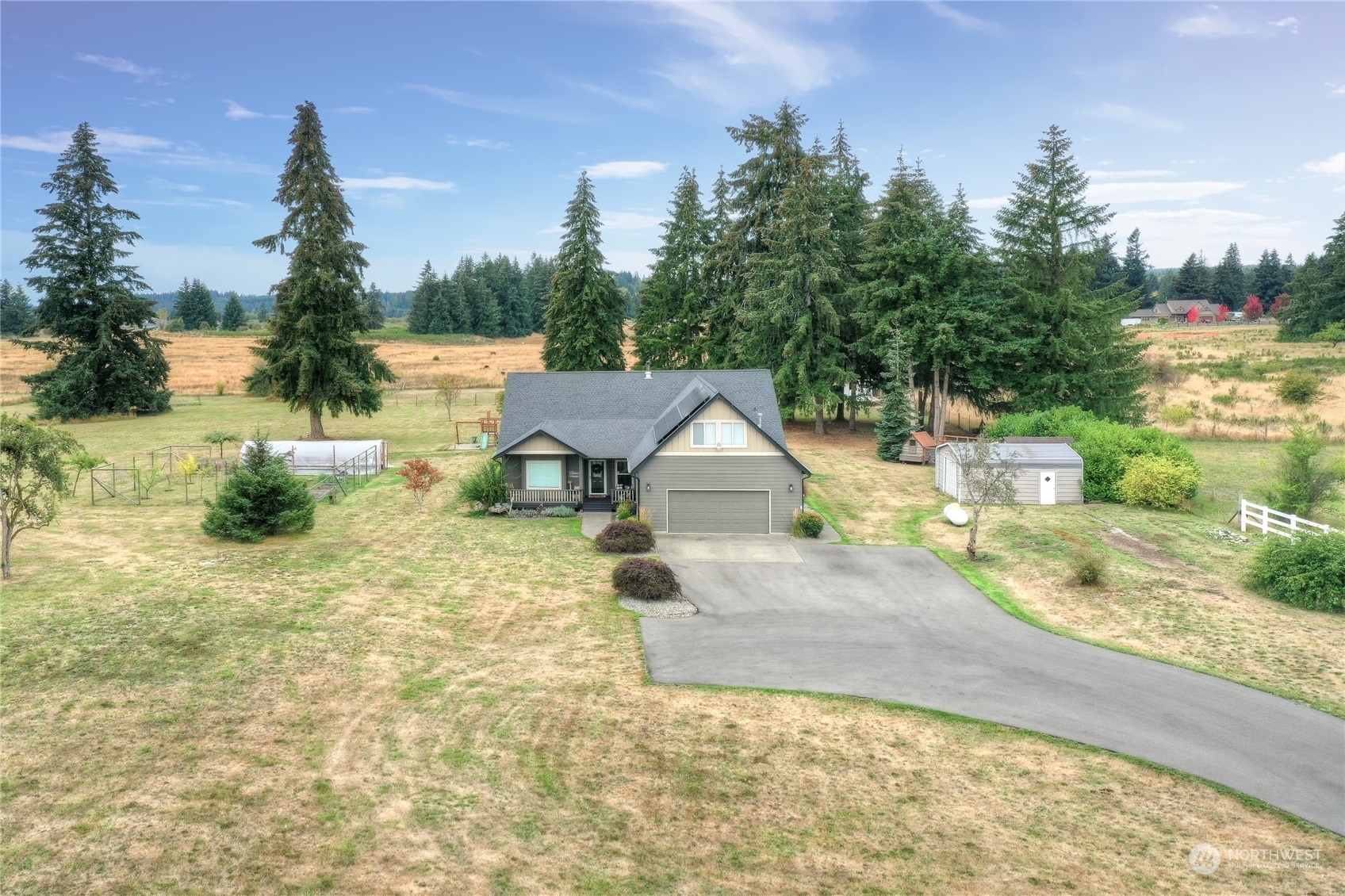 16637 Sheldon Lane Southwest Rochester, WA 98579 - Photo 3 of 40 a view of yard along with trees