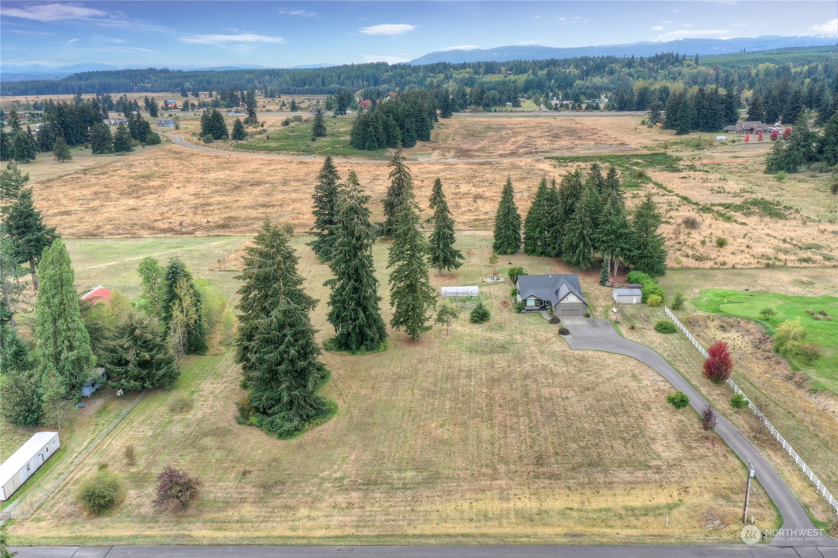 16637 Sheldon Lane Southwest Rochester, WA 98579 - Photo 38 of 40 a view of lake with mountain