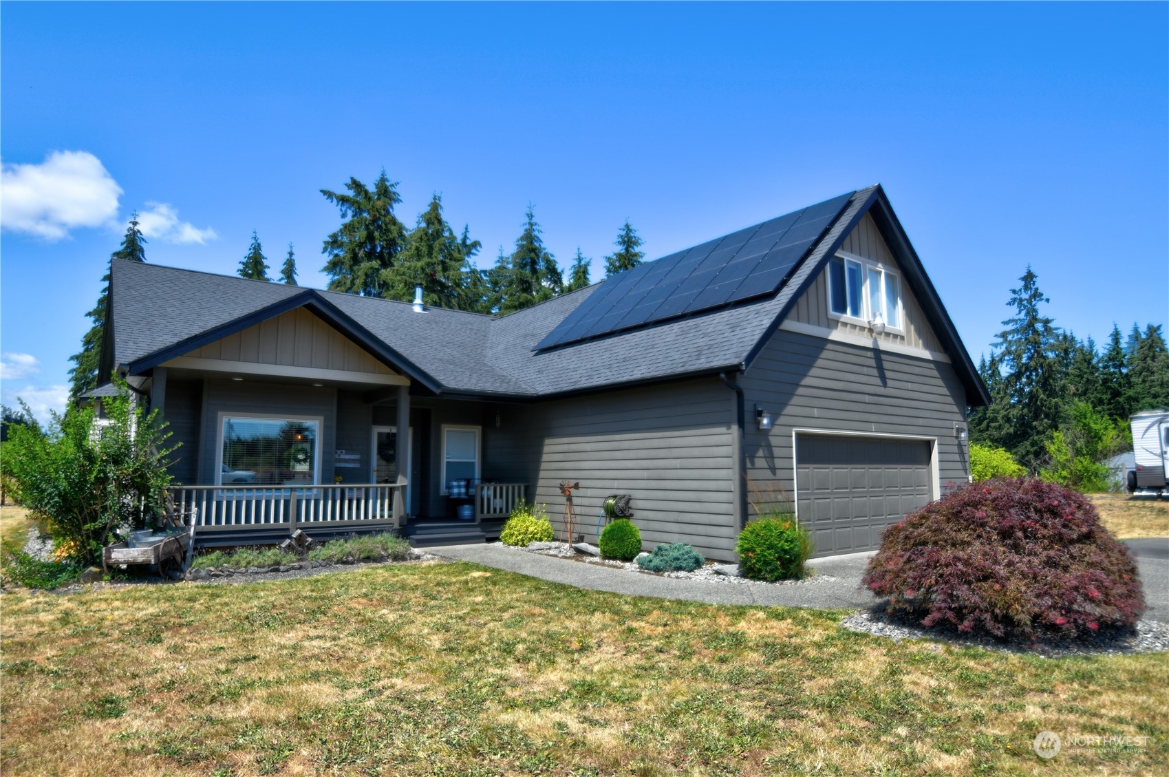 16637 Sheldon Lane Southwest Rochester, WA 98579 - Photo 4 of 40 a front view of a house with garden