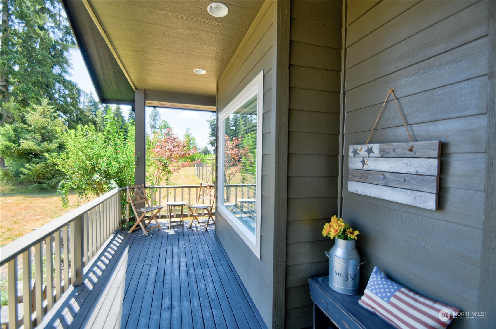 16637 Sheldon Lane Southwest Rochester, WA 98579 - Photo 5 of 40 a view of a balcony with wooden floor