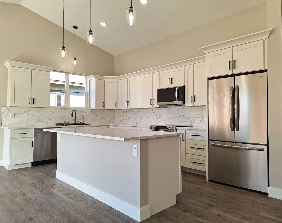 343 Lake View Road Hayden, CO 81639 - Photo 4 of 9 a kitchen with stainless steel appliances granite countertop a refrigerator a sink dishwasher a stove and a refrigerator