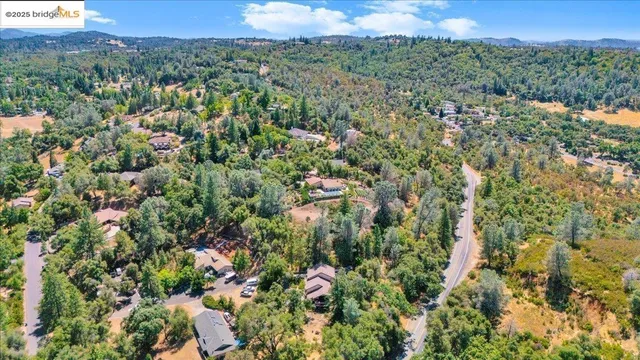 a view of a livingroom with furniture and wooden floor