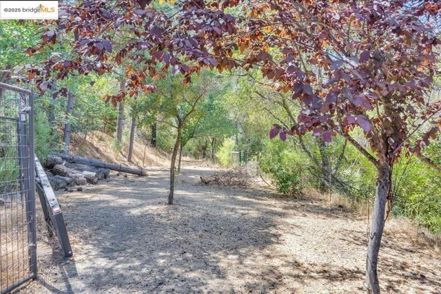 an aerial view of mountain with an outdoor space