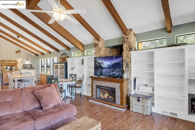 a view of a living room and dining room