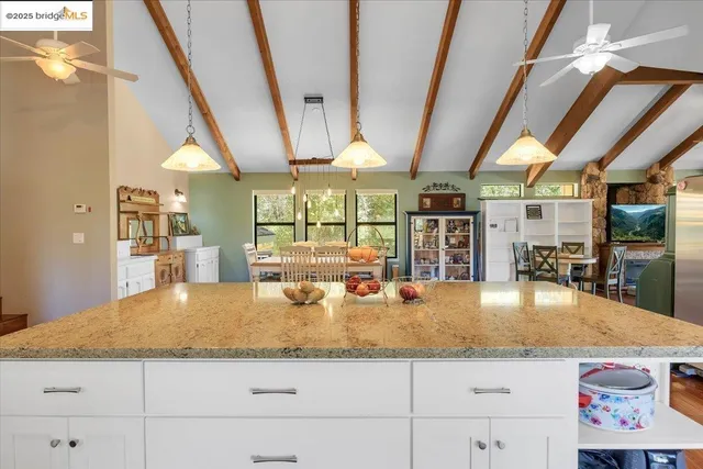 a bedroom with a large bed and a large window