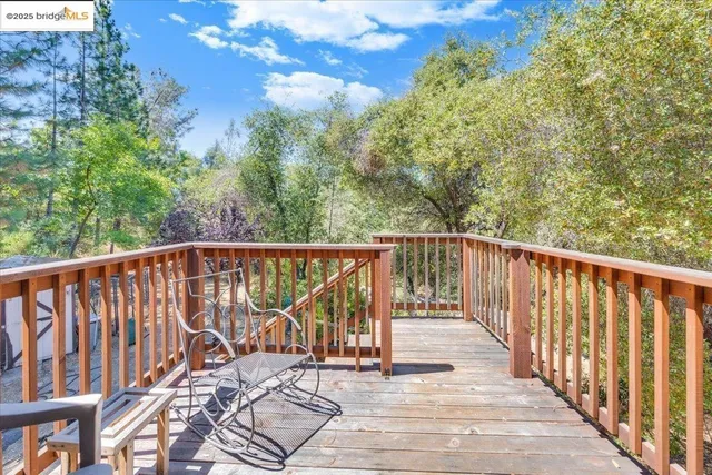 a view of a large window with lounge chair