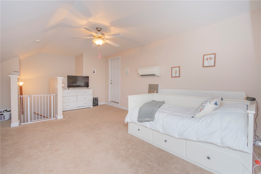 861 North Old Pendleton Road Liberty, SC 29657 - Photo 31 of 45 A versatile bonus room offers plush carpeting and a bright ceiling fan to enhance comfort.