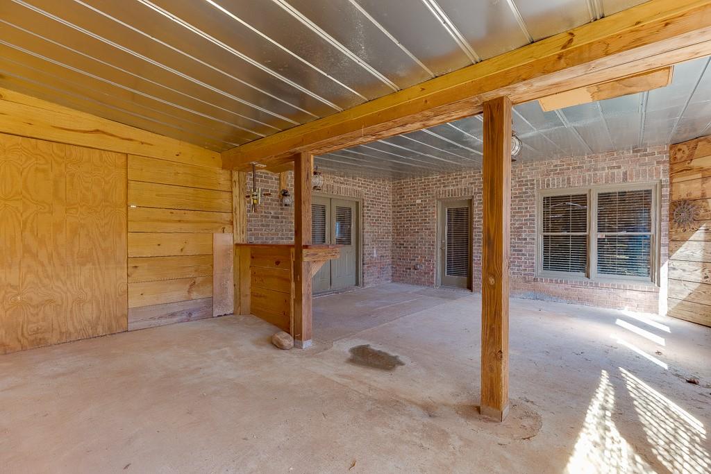 940 Chateau Forest Road Hoschton, GA 30548 - Photo 73 of 87 a view of a room with wooden walls