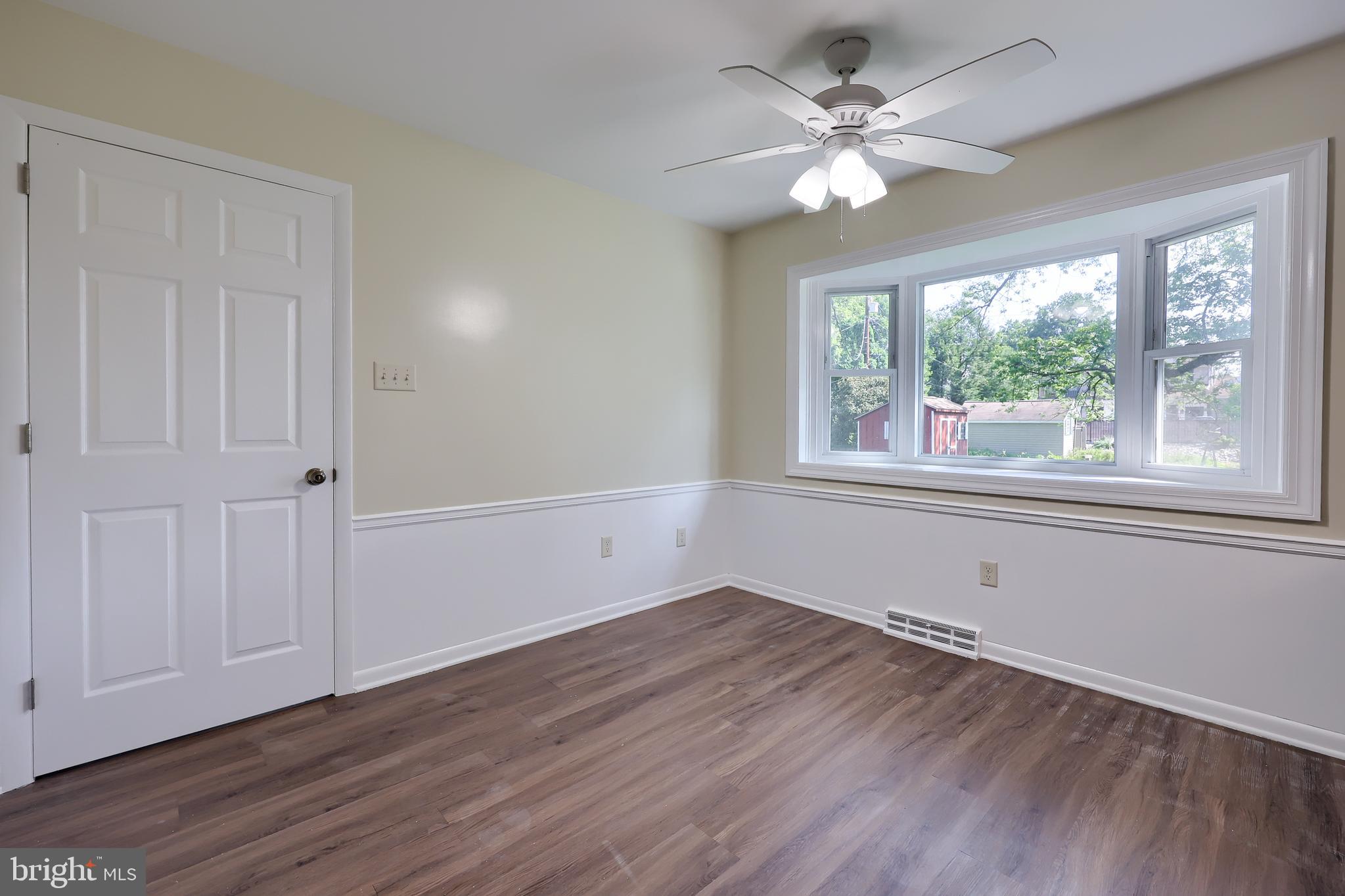 1046 Hunsicker Road Lancaster, PA 17601 - Photo 13 of 31 wooden floor in an empty room with a window
