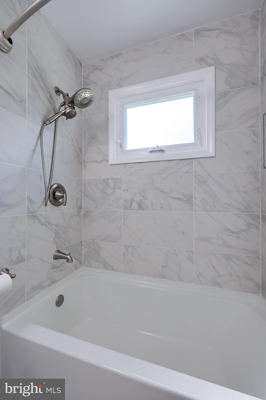 1046 Hunsicker Road Lancaster, PA 17601 - Photo 23 of 31 a bathroom with a shower and a bathtub
