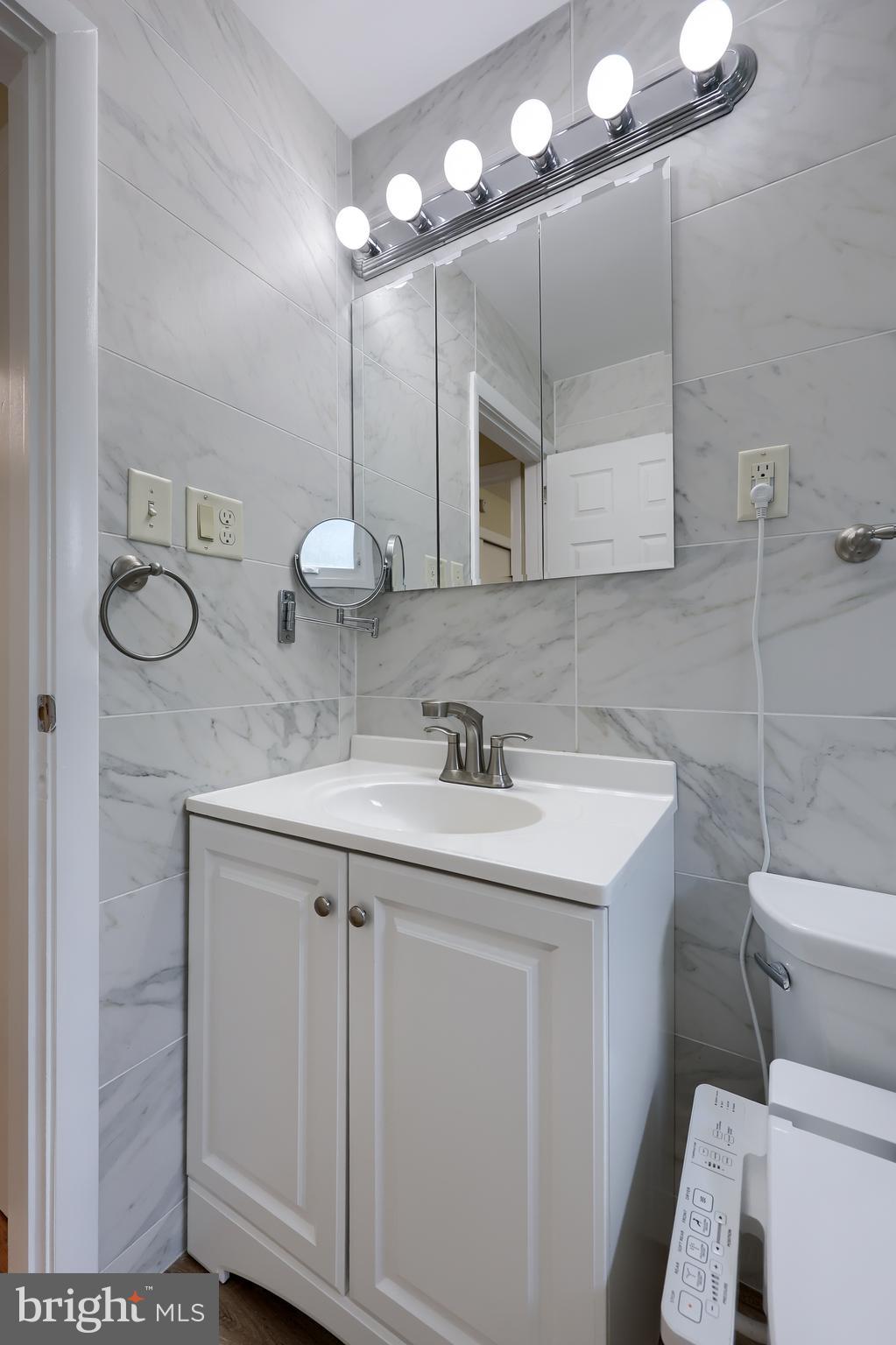 1046 Hunsicker Road Lancaster, PA 17601 - Photo 24 of 31 a bathroom with a sink and a toilet