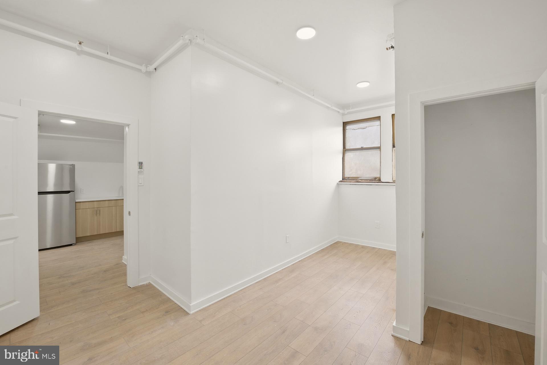 6012 Ridge Avenue, Unit 8 Philadelphia, PA 19128 - Photo 11 of 17 a view of hallway with a bathroom