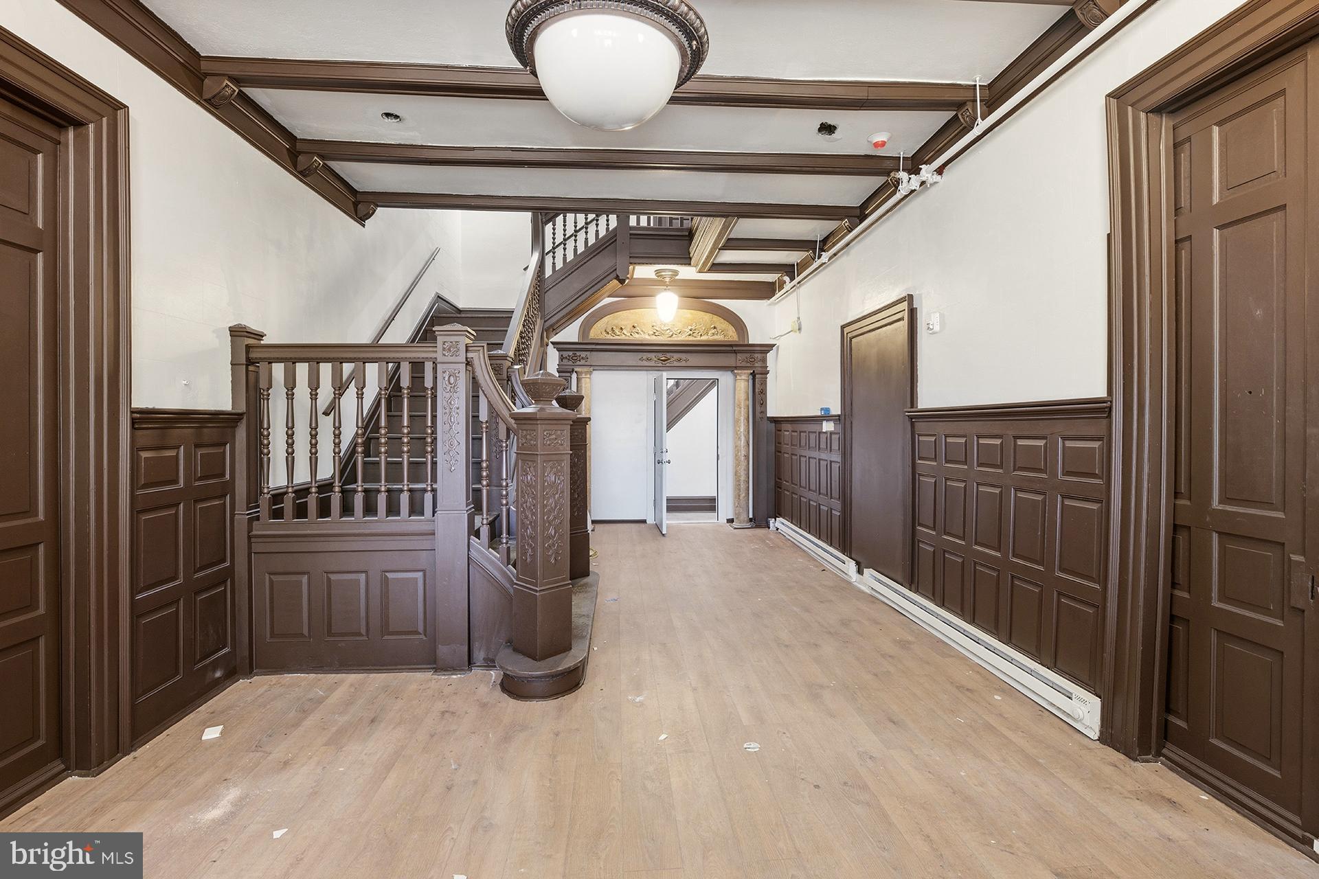 6012 Ridge Avenue, Unit 8 Philadelphia, PA 19128 - Photo 13 of 17 a view of hallway with wooden floor