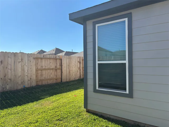 a view of a backyard with a garden