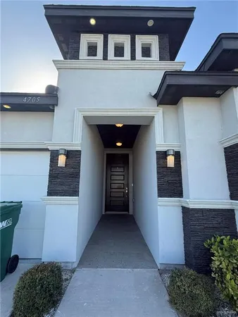 a view of a car garage of the house