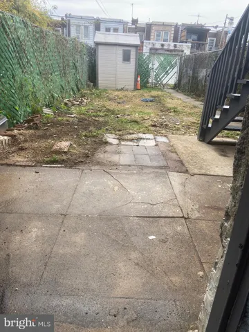 a view of a terrace with yard