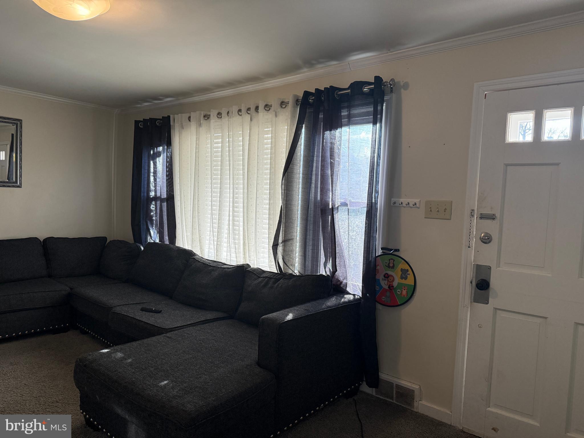 685 Colonial Avenue York, PA 17403 - Photo 5 of 45 a living room with furniture and a fireplace
