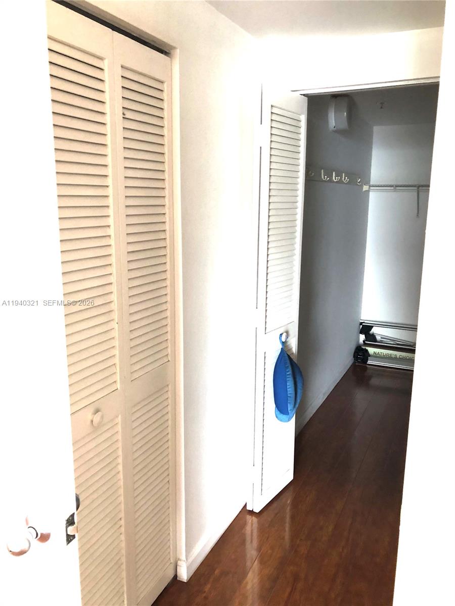 701 Brickell Key Boulevard, Unit LPH01 Miami, FL 33131 - Photo 10 of 15 a view of hallway with windows and couch