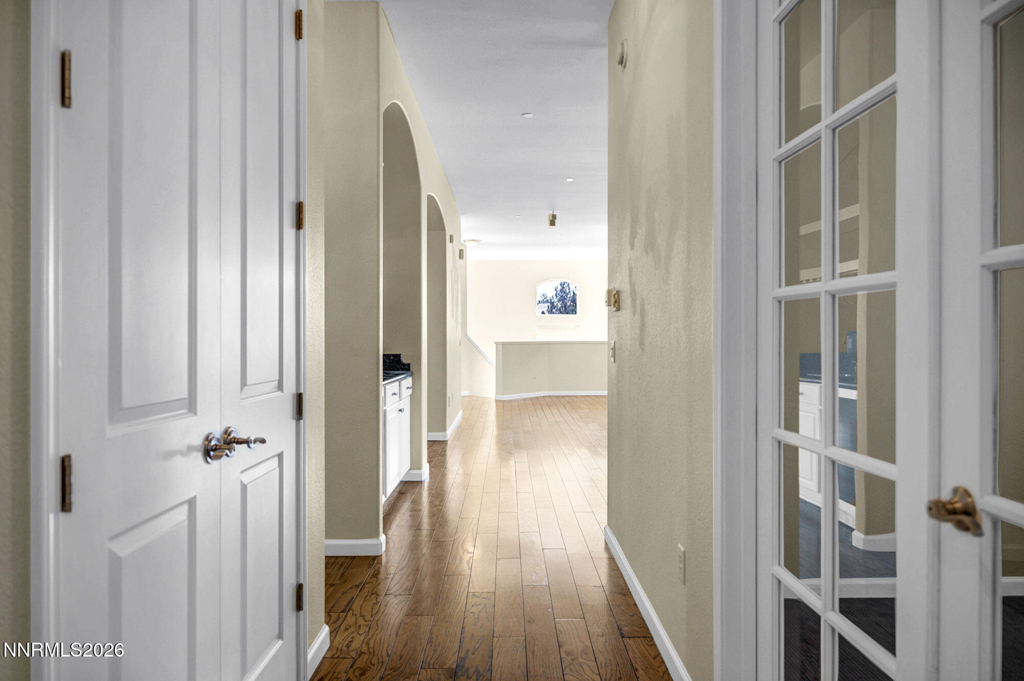 9900 Wilbur May Parkway, Unit 2504 Reno, NV 89521 - Photo 23 of 78 a view of a hallway with wooden floor and staircase