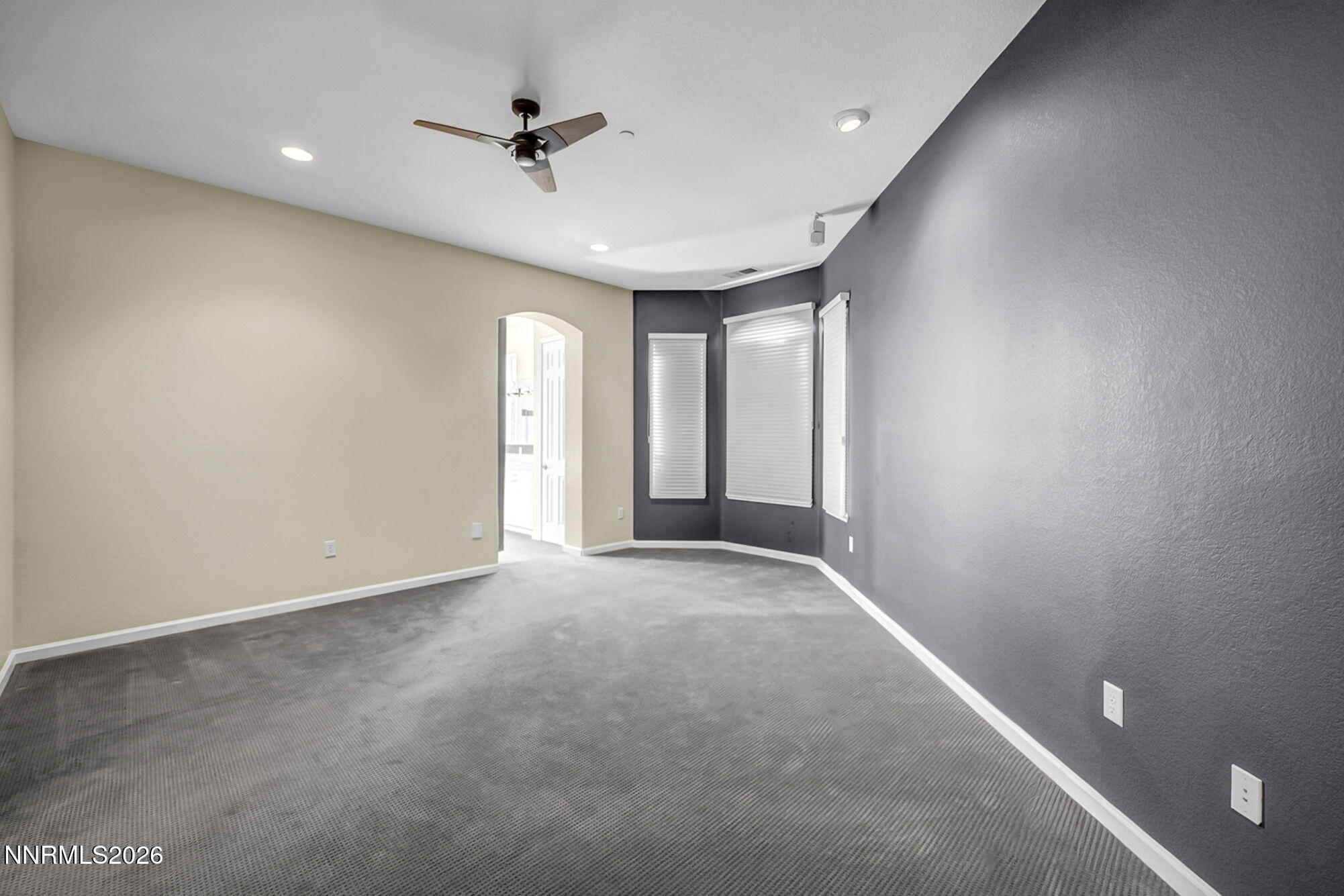 9900 Wilbur May Parkway, Unit 2504 Reno, NV 89521 - Photo 26 of 64 an empty room with a ceiling fan and a window