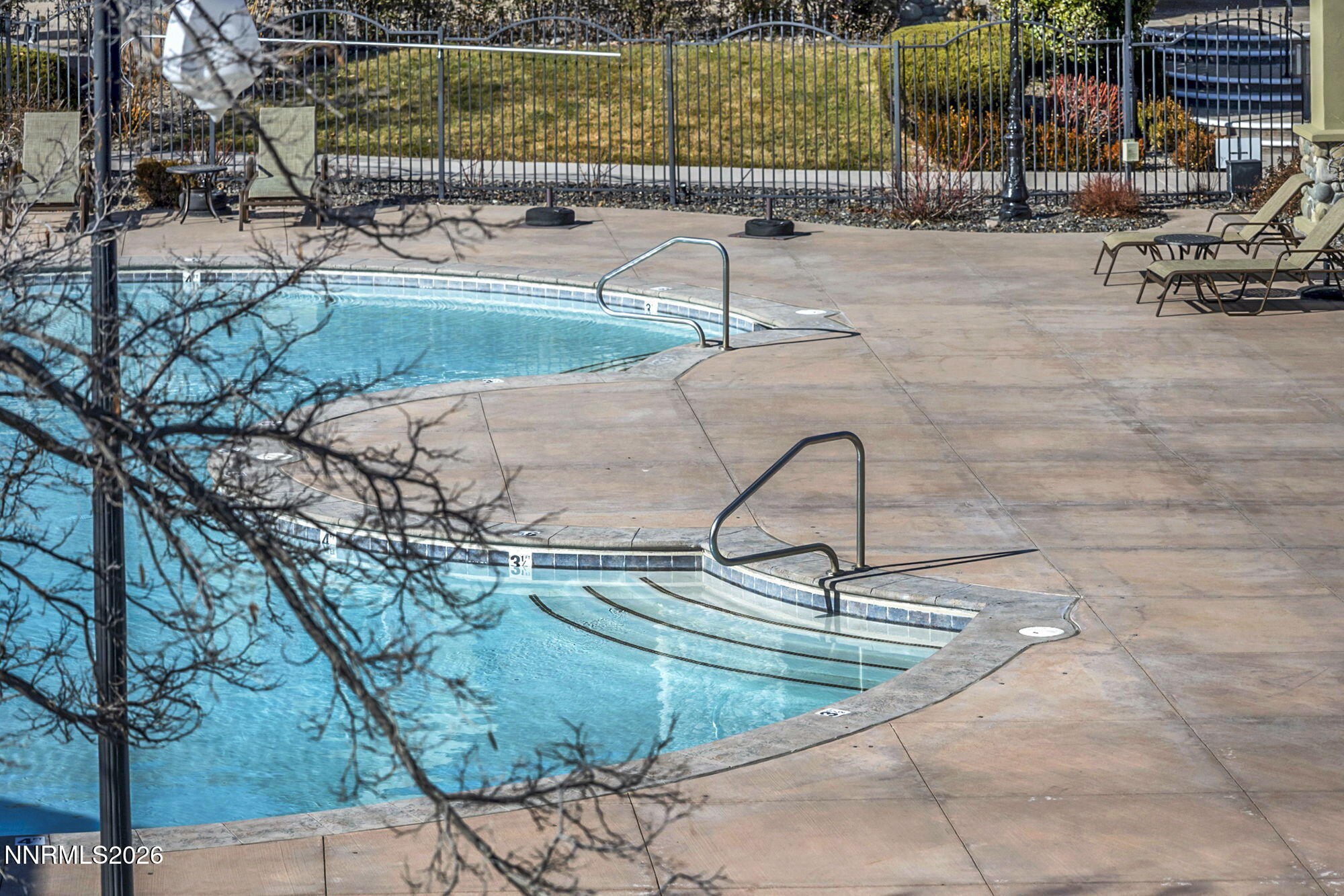 9900 Wilbur May Parkway, Unit 2504 Reno, NV 89521 - Photo 54 of 64 a view of a swimming pool with a patio