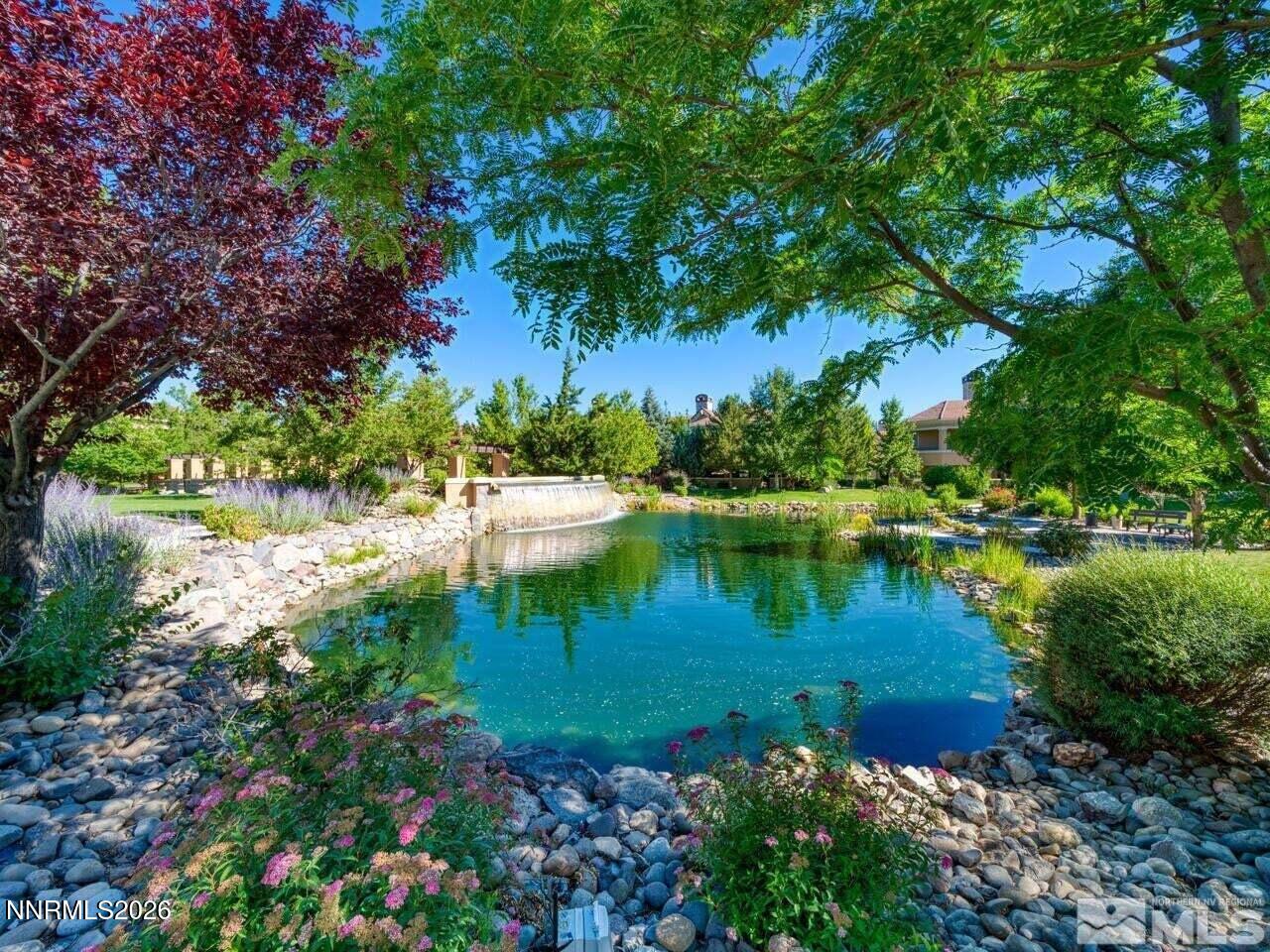 9900 Wilbur May Parkway, Unit 2504 Reno, NV 89521 - Photo 63 of 64 a view of a lake with a house