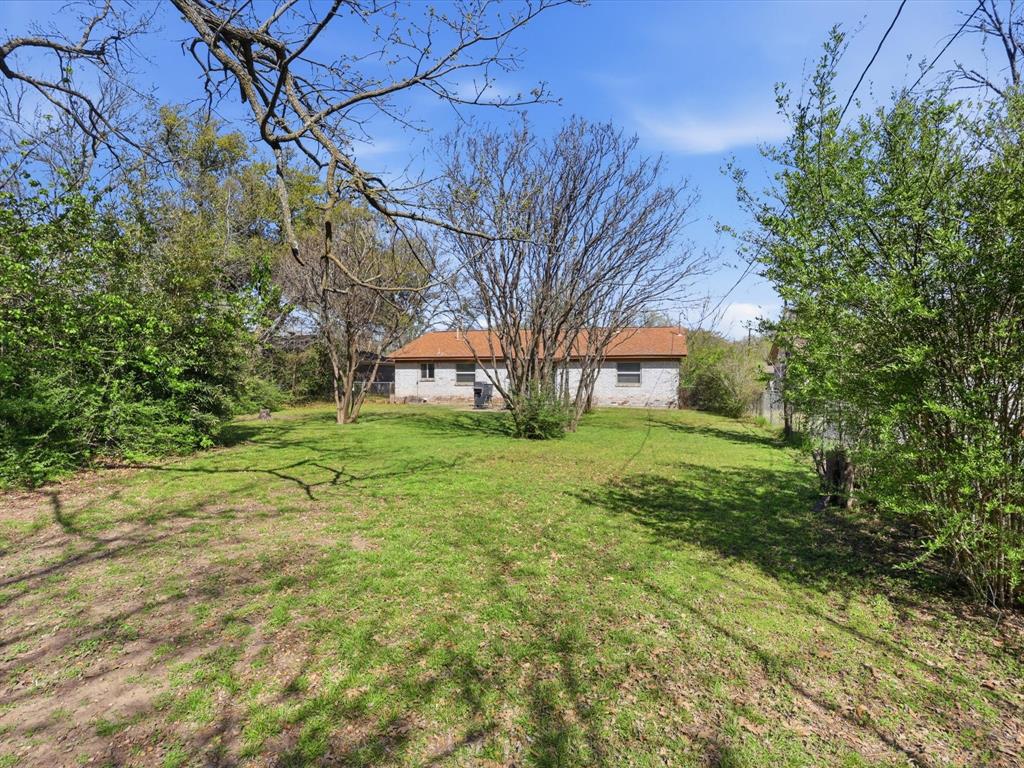 3228 Hummingbird Lane Denton, TX 76209 - Photo 24 of 27 a view of yard with tree