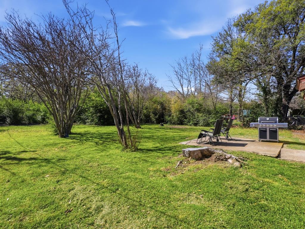 3228 Hummingbird Lane Denton, TX 76209 - Photo 25 of 27 a view of a park with large trees